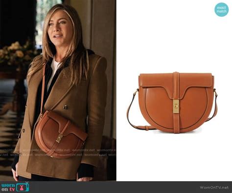 celine bag in the morning show|Alex’s camel coat and tan bag on The Morning Show .